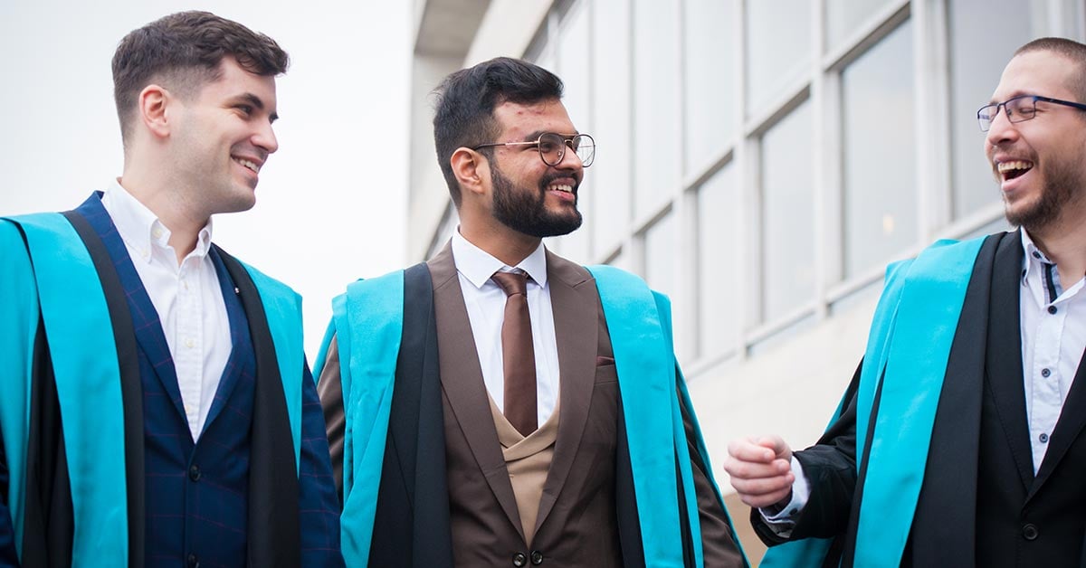 Three students attending Kings College London graduation