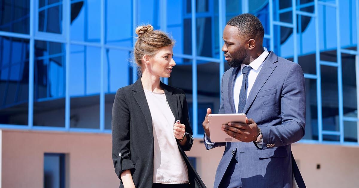 Digital Law professionals having a meeting outside an office building